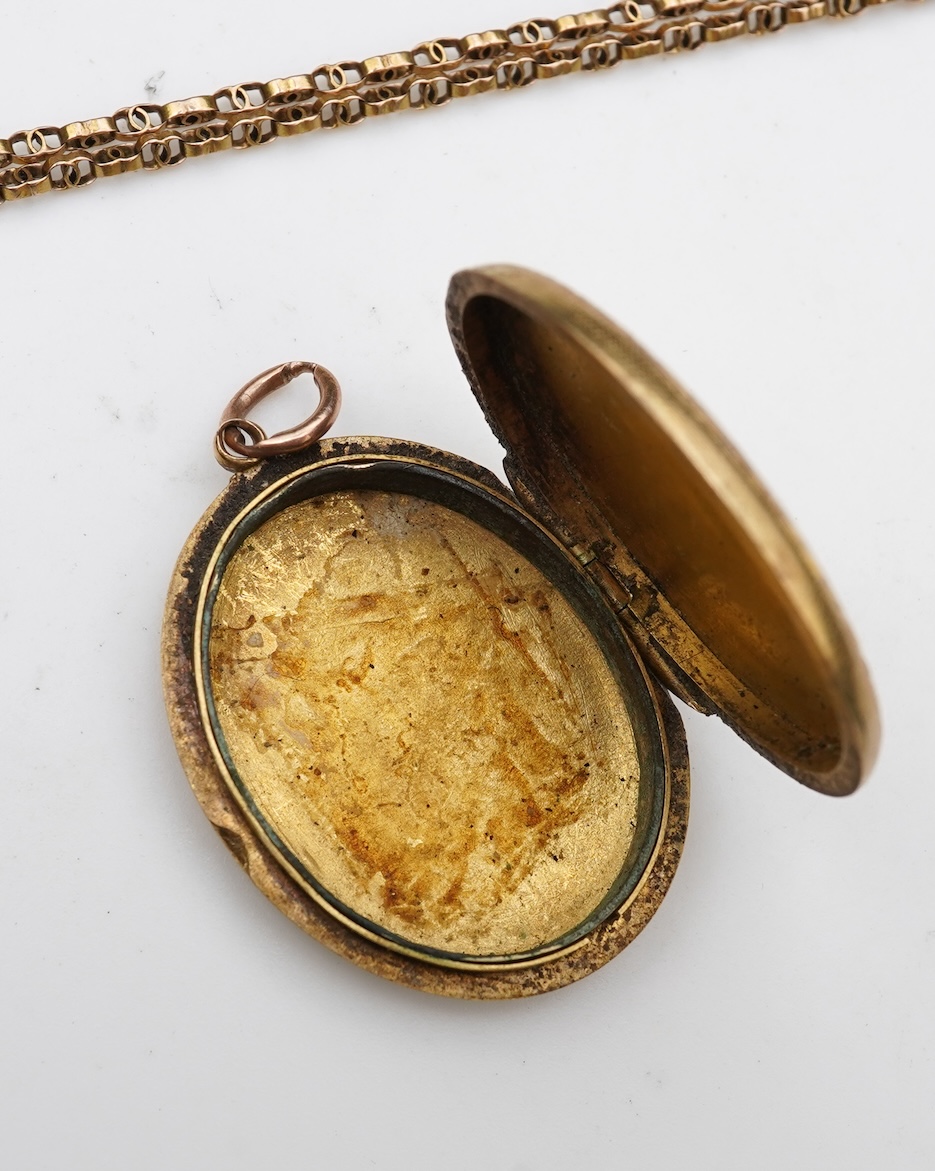 A Victorian gold locket and chain, late 19th century